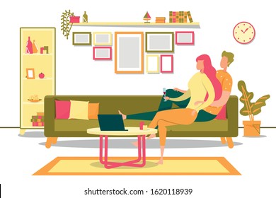 Couple have Romantic Date Movie Night at Home. They Lying on Sofa in Cozy Room. Girl Holds Glass Wine in her Hand, and Guy Hugs her from Back. Candles and Laptop on Table, they Watching Movie.