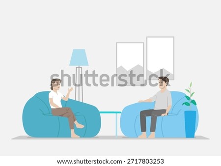 Couple Having Casual Conversation in a Modern Blue Grey Theme Living Space
