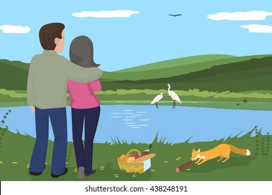 couple having picnic at wilderness