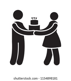 
A couple holding birthday cake together for couple anniversary 
