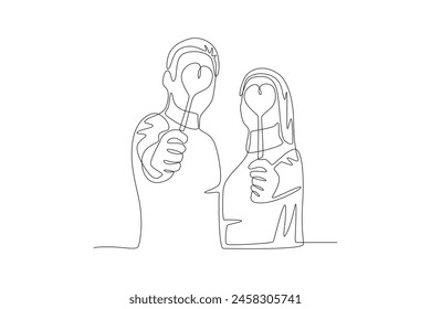 Couple holding candy in love. Dia dos namorados concept one-line drawing