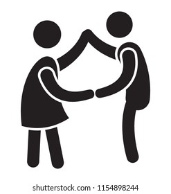 
Couple holding hands and moving their bodies to show dancing couple concept 
