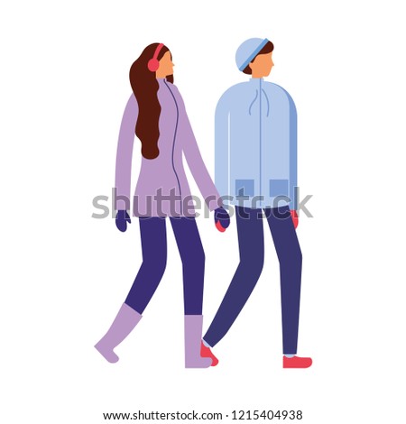 couple holding hands with winter clothes