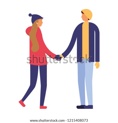 couple holding hands with winter clothes