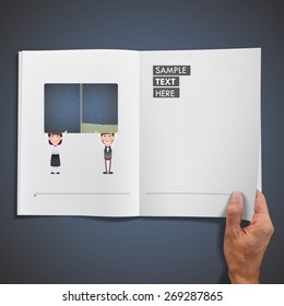 Couple holding a notebook and printed on book