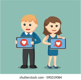 couple holding phone tablet