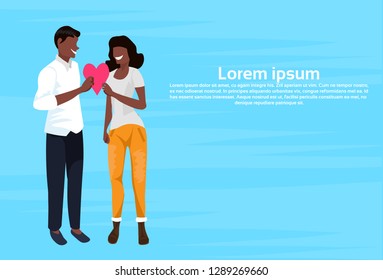 couple holding red heart shape happy valentines day holiday concept african american man woman in love male female cartoon characters full length horizontal copy space