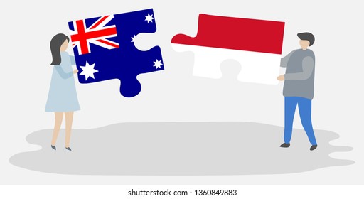 Couple holding two puzzles pieces with Australian and Monegasque flags. Australia and Monaco national symbols together.