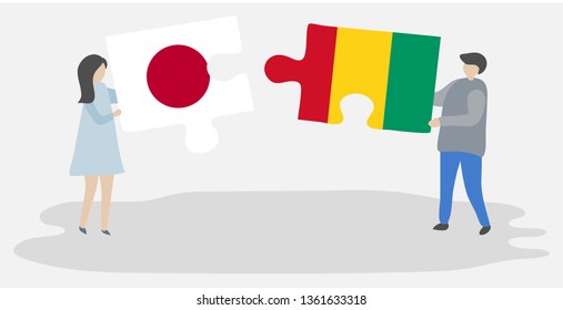 Couple holding two puzzles pieces with Japanese and Guinean flags. Japan and Guinea national symbols together.