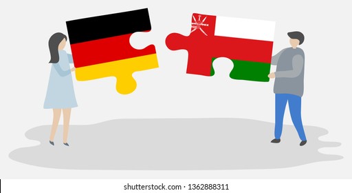 Couple holding two puzzles pieces with German and Omani flags. Germany and Oman national symbols together.