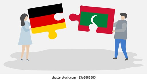 Couple holding two puzzles pieces with German and Maldivian flags. Germany and Maldives national symbols together.