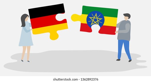 Couple holding two puzzles pieces with German and Ethiopian flags. Germany and Ethiopia national symbols together.