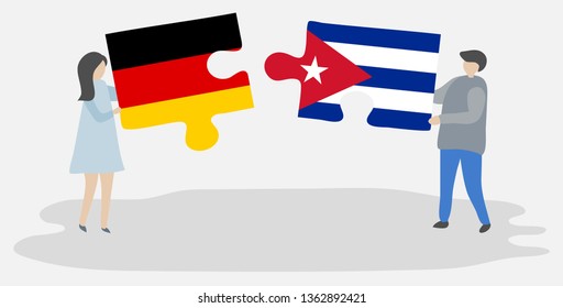 Couple holding two puzzles pieces with German and Cuban flags. Germany and Cuba national symbols together.