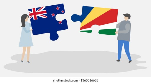 Couple holding two puzzles pieces with NZ and Seychellois flags. New Zealand and Seychelles national symbols together.