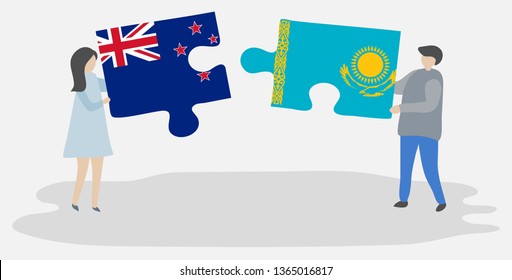 Couple holding two puzzles pieces with NZ and Kazakh flags. New Zealand and Kazakhstan national symbols together.