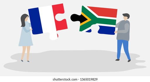 Couple holding two puzzles pieces with French and South African flags. France and South Africa national symbols together.