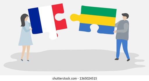 Couple holding two puzzles pieces with French and Gabonese flags. France and Gabon national symbols together.