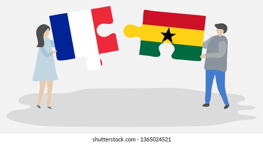 Couple holding two puzzles pieces with French and Ghanaian flags. France and Ghana national symbols together.
