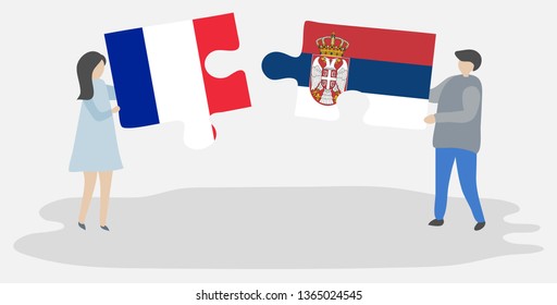Couple holding two puzzles pieces with French and Serbian flags. France and Serbia national symbols together.