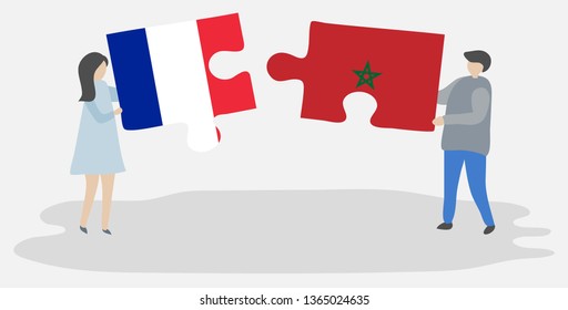 Couple holding two puzzles pieces with French and Moroccan flags. France and Morocco national symbols together.