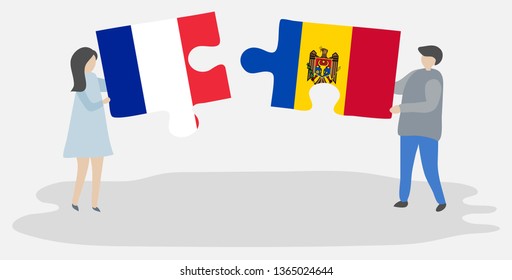 Couple holding two puzzles pieces with French and Moldovan flags. France and Moldova national symbols together.