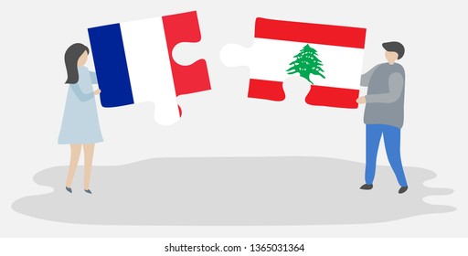 Couple holding two puzzles pieces with French and Lebanese flags. France and Lebanon national symbols together.