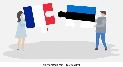 Couple holding two puzzles pieces with French and Estonian flags. France and Estonia national symbols together.