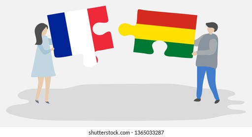 Couple holding two puzzles pieces with French and Bolivian flags. France and Bolivia national symbols together.