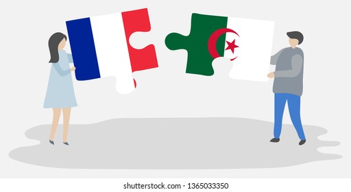 Couple holding two puzzles pieces with French and Algerian flags. France and Algeria national symbols together.