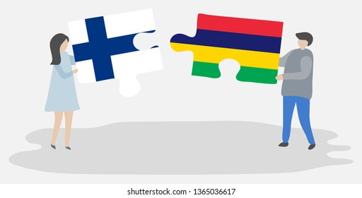 Couple holding two puzzles pieces with Finnish and Mauritian flags. Finland and Mauritius national symbols together.