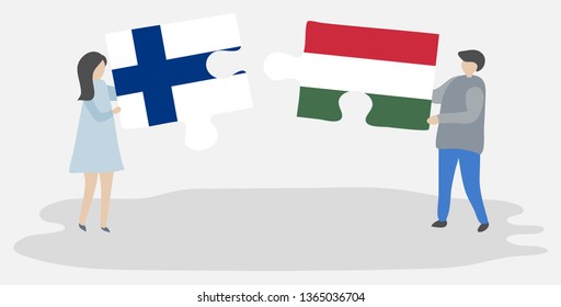 Couple holding two puzzles pieces with Finnish and Hungarian flags. Finland and Hungary national symbols together.