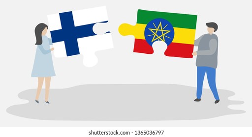 Couple holding two puzzles pieces with Finnish and Ethiopian flags. Finland and Ethiopia national symbols together.