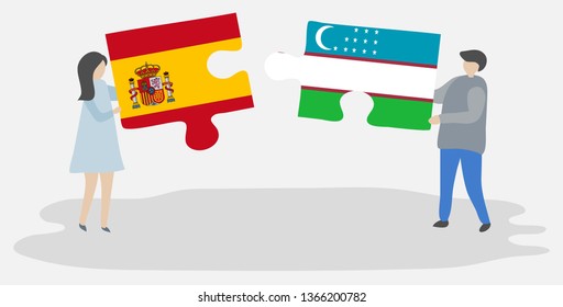Couple holding two puzzles pieces with Spanish and Uzbek flags. Spain and Uzbekistan national symbols together.
