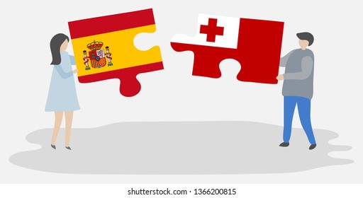 Couple holding two puzzles pieces with Spanish and Tongan flags. Spain and Tonga national symbols together.