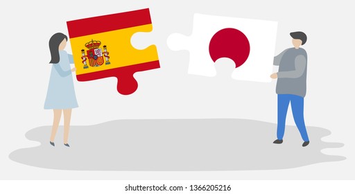 Couple holding two puzzles pieces with Spanish and Japanese flags. Spain and Japan national symbols together.