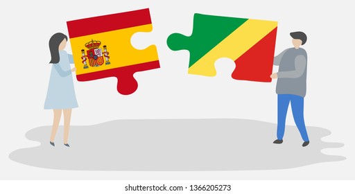 Couple holding two puzzles pieces with Spanish and Congolese flags. Spain and Republic of the Congo national symbols together.