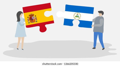Couple holding two puzzles pieces with Spanish and Nicaraguan flags. Spain and Nicaragua national symbols together.