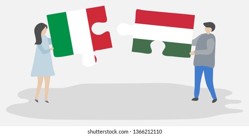 Couple holding two puzzles pieces with Italian and Hungarian flags. Italy and Hungary national symbols together.