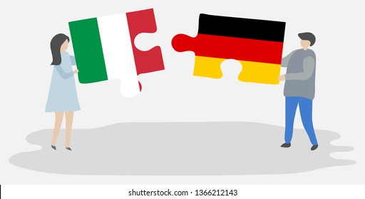 Couple holding two puzzles pieces with Italian and German flags. Italy and Germany national symbols together.