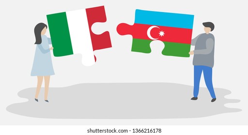 Couple holding two puzzles pieces with Italian and Azerbaijani flags. Italy and Azerbaijan national symbols together.