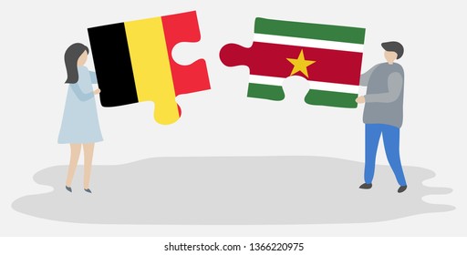 Couple holding two puzzles pieces with Belgian and Surinamese flags. Belgium and Suriname national symbols together.