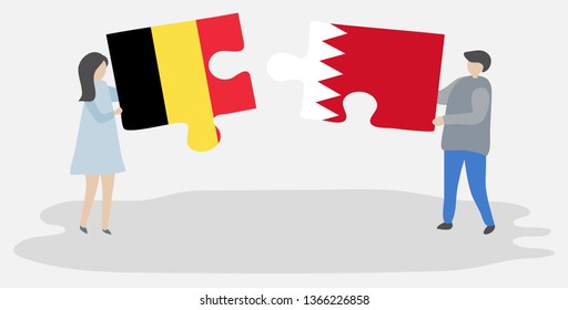 Couple holding two puzzles pieces with Belgian and Bahraini flags. Belgium and Bahrain national symbols together.