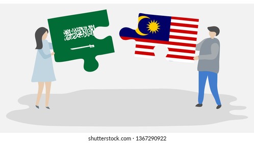 Couple holding two puzzles pieces with Saudi Arabian and Malaysian flags. Saudi Arabia and Malaysia national symbols together.