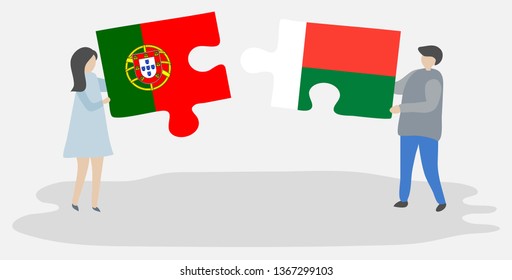 Couple holding two puzzles pieces with Portuguese and Malagasy flags. Portugal and Madagascar national symbols together.