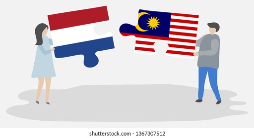 Couple holding two puzzles pieces with Dutch and Malaysian flags. Netherlands and Malaysia national symbols together.