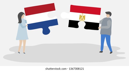 Couple holding two puzzles pieces with Dutch and Egyptian flags. Netherlands and Egypt national symbols together.