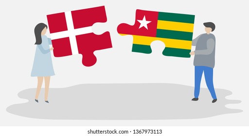 Couple holding two puzzles pieces with Danish and Togolese flags. Denmark and Togo national symbols together.