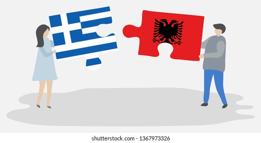 Couple holding two puzzles pieces with Greek and Albanian flags. Greece and Albania national symbols together.