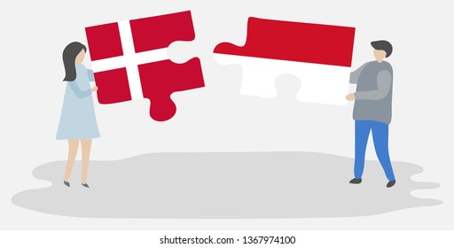Couple holding two puzzles pieces with Danish and Indonesian flags. Denmark and Indonesia national symbols together.