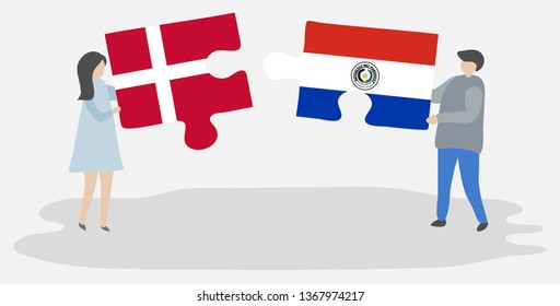 Couple holding two puzzles pieces with Danish and Paraguayan flags. Denmark and Paraguay national symbols together.